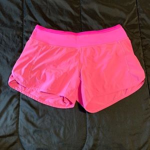 Pink Lululemon running shorts size 4